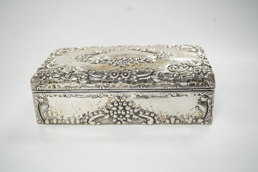 A late Victorian embossed silver rectangular trinket box (converted from a cigarette box), Joseph Braham, London, 1900, 17.5cm. Condition - fair to good